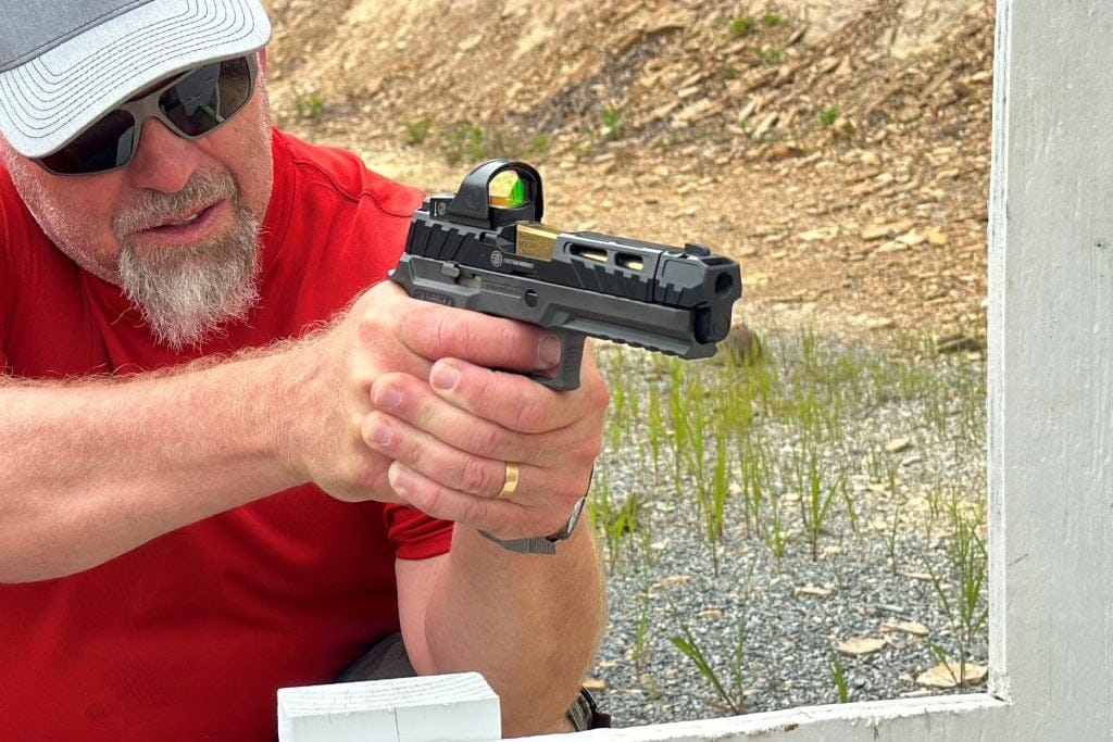 Author Todd Burgeen shooting the SIG SAUER P320-SPECTRE COMP